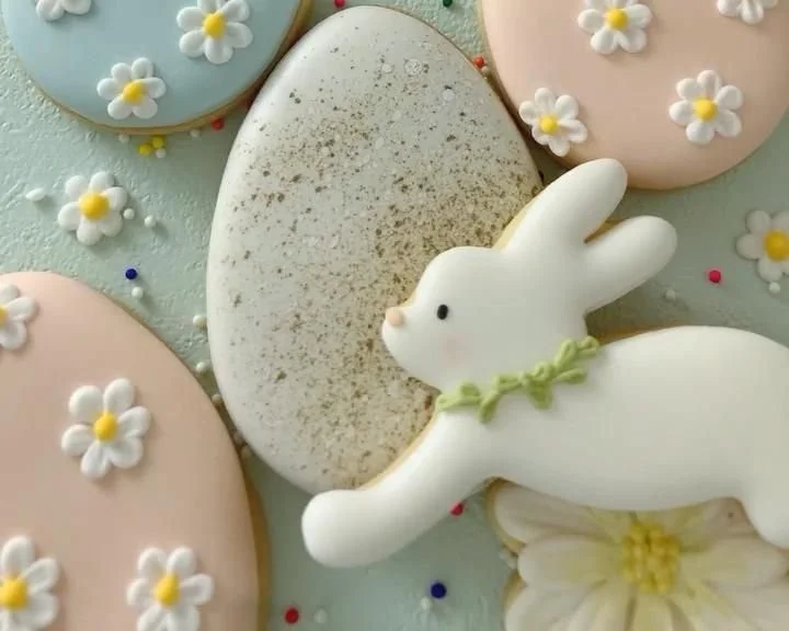 Colorful and decorated Easter cookies on a festive plate