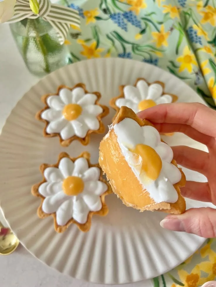 Daisy Lemon Meringue Pie by Alice Fevronia, showcasing a fluffy meringue and lemon filling.