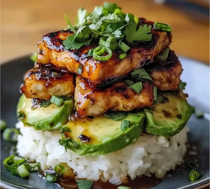 Honey Lime Chicken served on avocado rice stack for a delicious meal