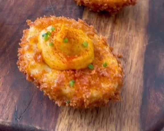 Delicious deviled eggs arranged on a platter, showcasing a classic recipe.