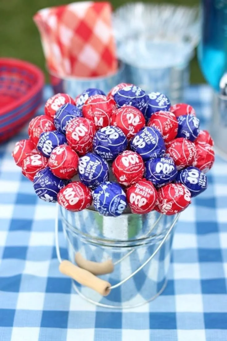 Easy & Fun 4th of July Party Ideas: Decorations, Food & More! 1 Colorful 4th of July party setup with decorations and festive food.