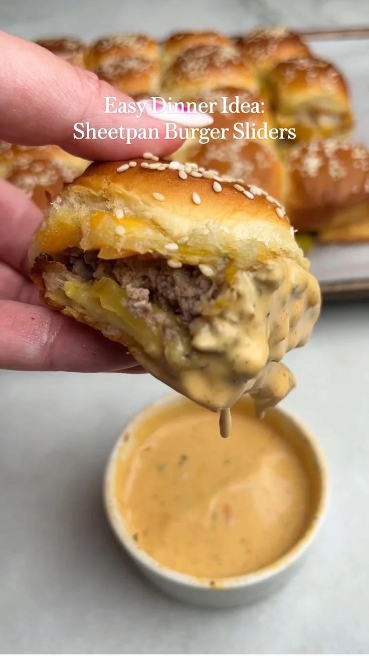 Delicious Hawaiian Roll cheeseburger sliders stacked on a platter