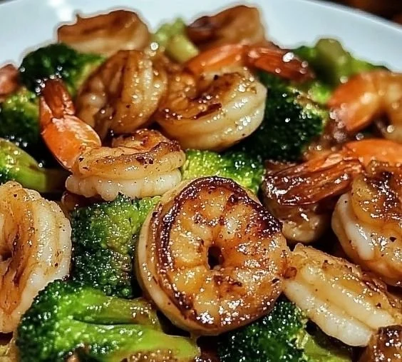 High-protein honey garlic shrimp served with fresh vegetables