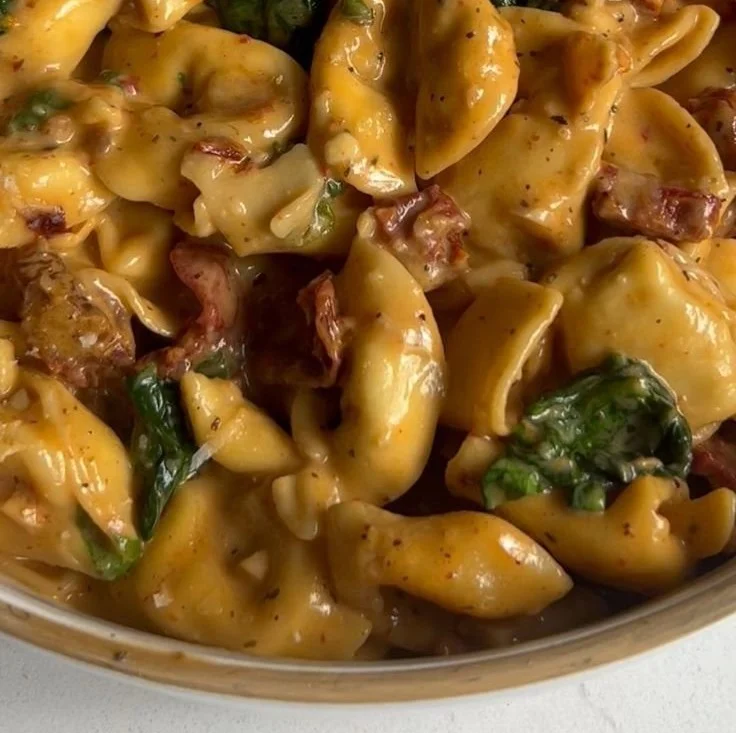 Delicious Marry Me Tortellini served with fresh herbs and sauce.