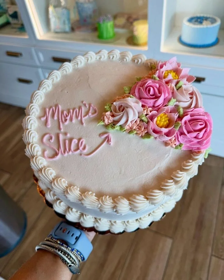 Delicious Mother’s Day cake decorated with flowers and a heart-shaped design