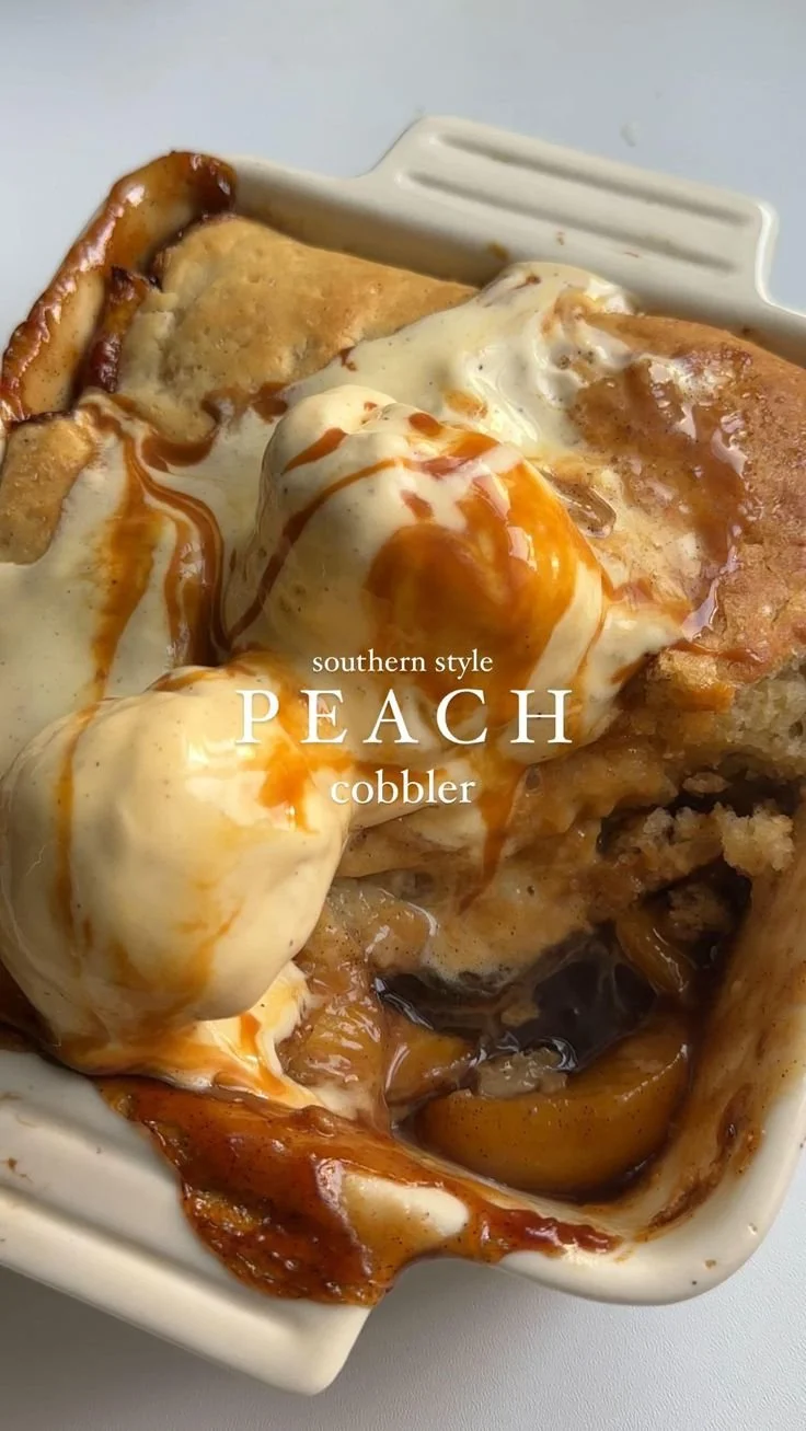 Peach Cobbler 6 Delicious homemade peach cobbler served in a rustic dish with fresh peaches