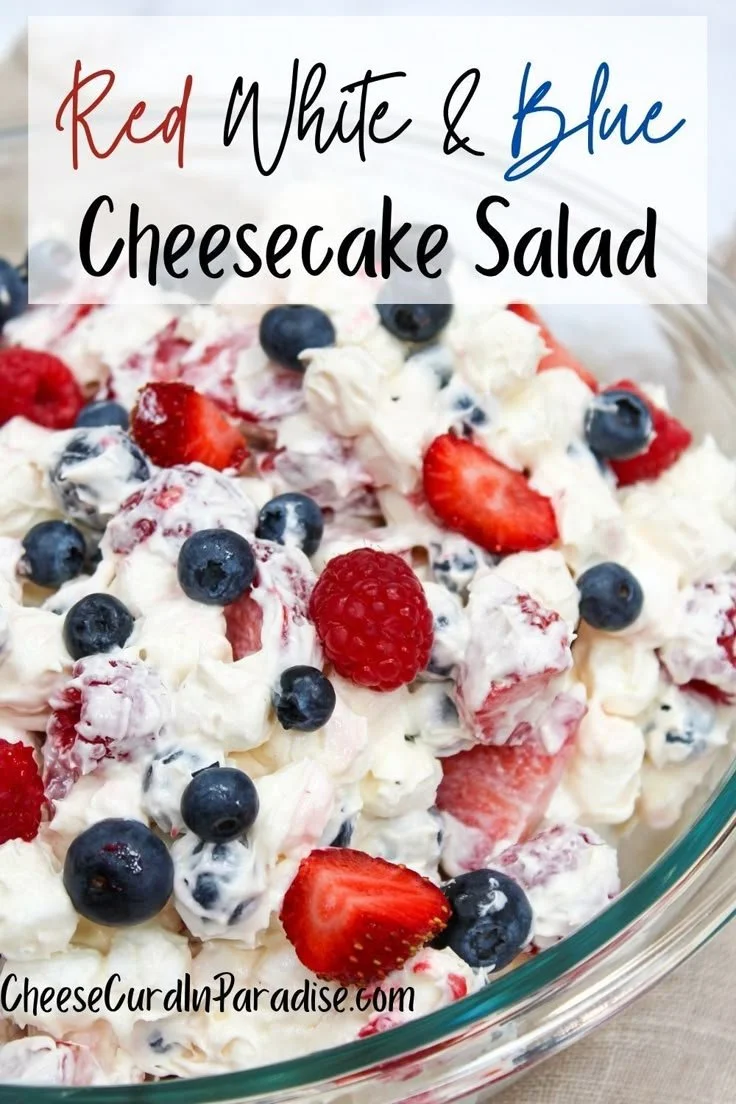 Red White and Blue Cheesecake Salad with strawberries, blueberries, and creamy cheesecake dressing