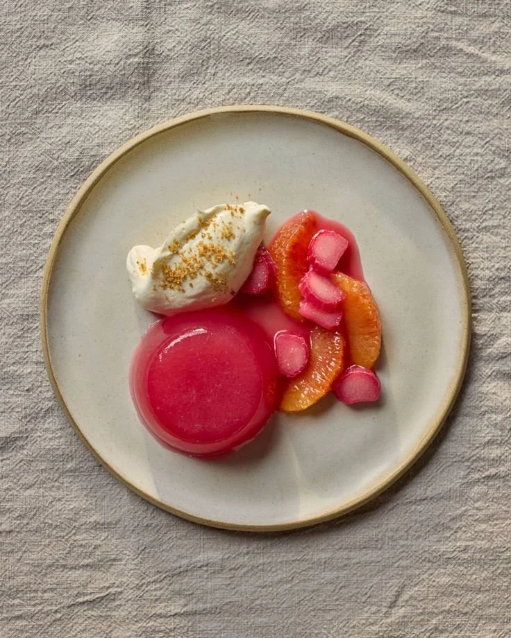 Homemade rhubarb jelly in a jar with bright colors