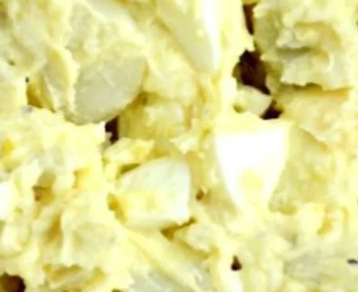 Southern Potato Salad 6 Delicious Southern potato salad served in a bowl with herbs