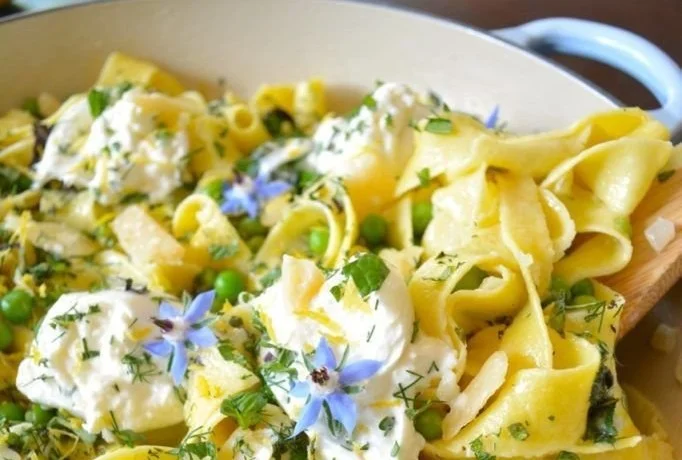 Spring Pea & Herb Pasta topped with Fresh Burrata and vibrant herbs