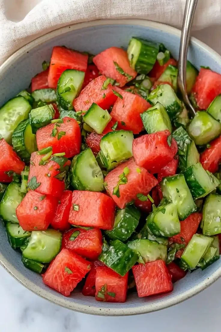Delicious Watermelon Cucumber Salad with fresh herbs and lime dressing